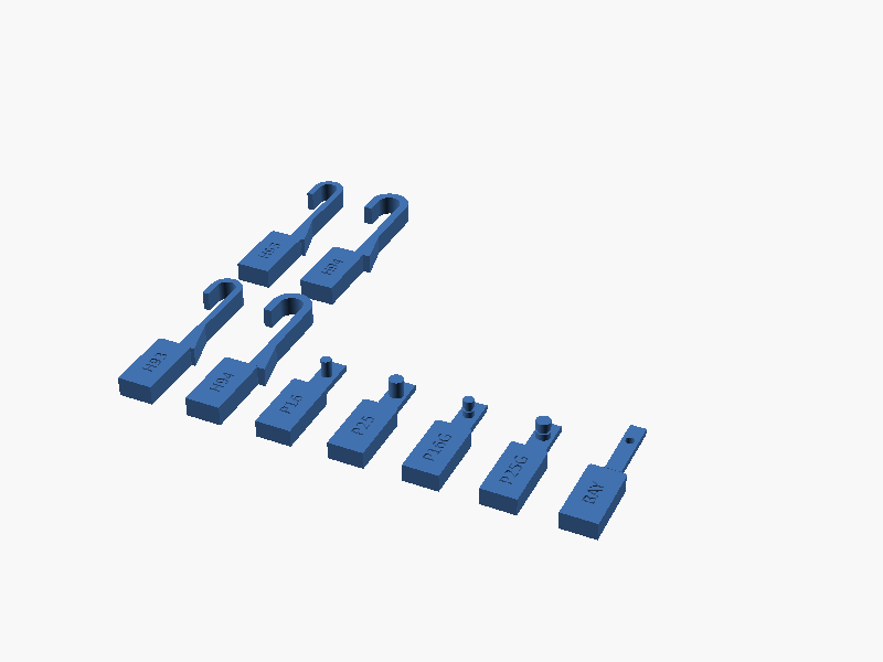 CAD render of nine labelled test pieces: two 9 × 3 J-hooks, two 9 × 4 J-hooks, four side pins, and a bayonet.